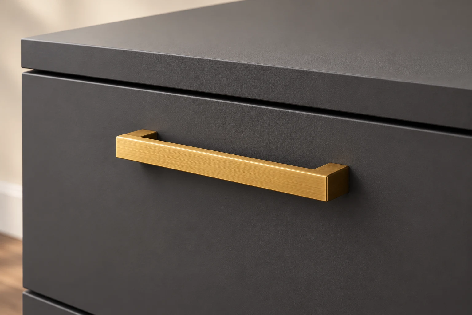 Brass-tone bar handle style detail