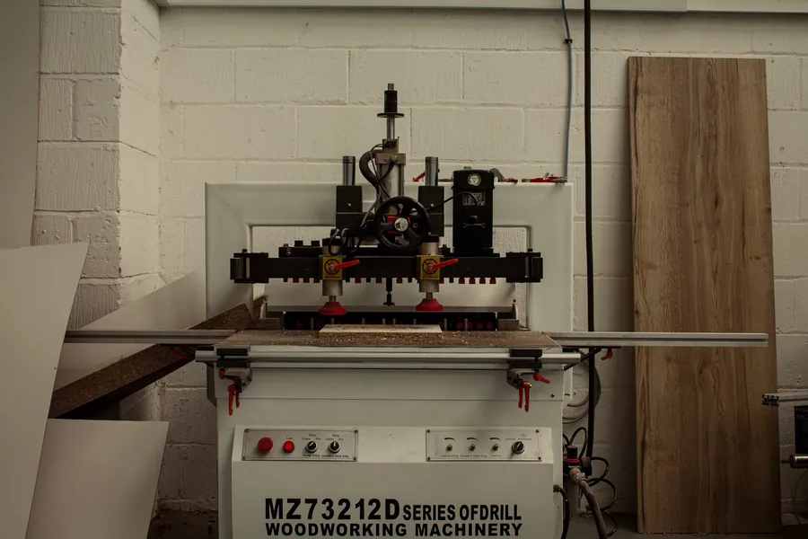 Multi-spindle boring machine for cabinet joinery