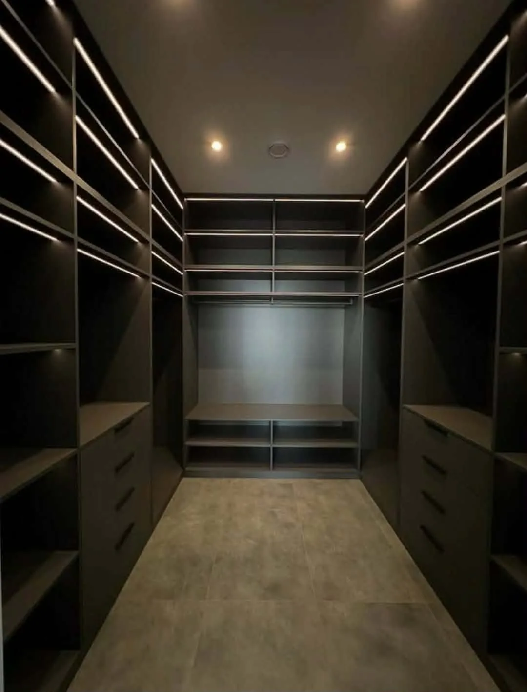 Fitted walk-in wardrobe suite with hanging space and drawers — design visual
